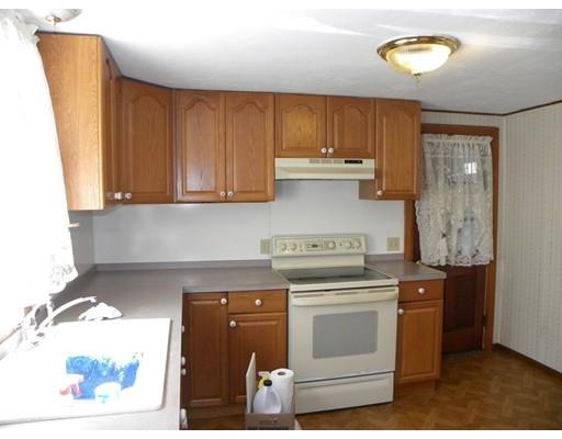 300 Partridge Hill Road Charlton, MA 01507 - Photo 5 of 39 a kitchen with a stove and a cabinet