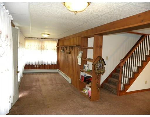 300 Partridge Hill Road Charlton, MA 01507 - Photo 6 of 39 a view of a livingroom with wooden floor and windows