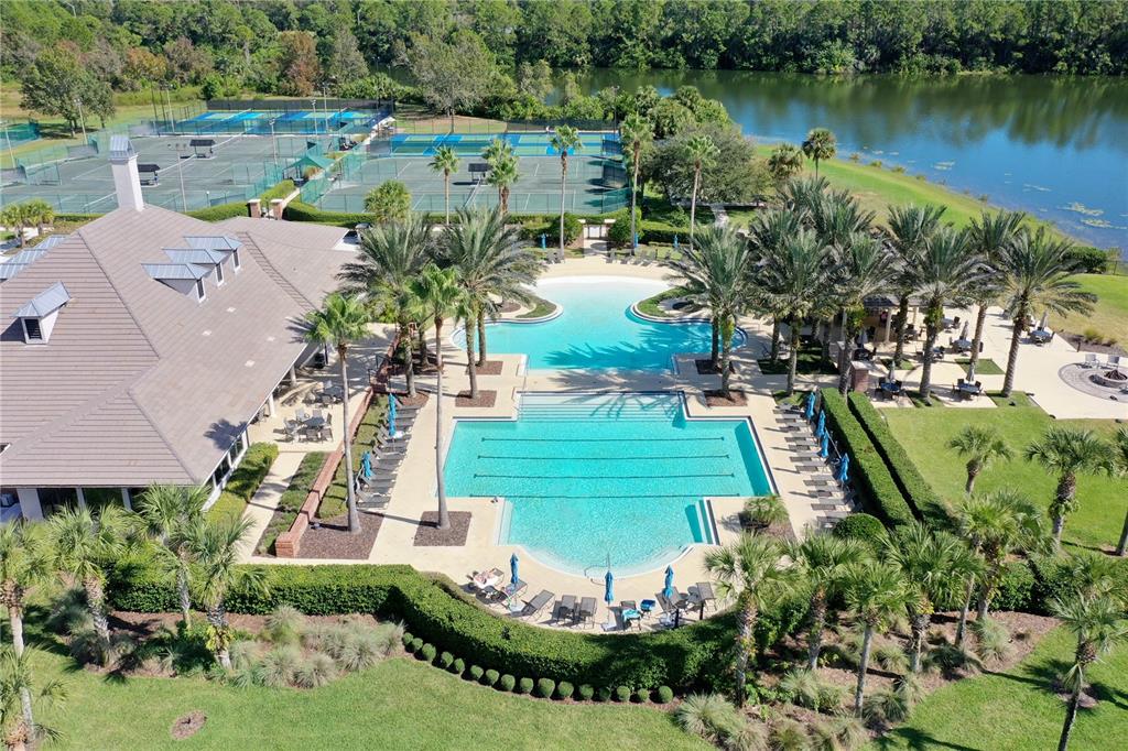 426 Long Cove Road Ormond Beach, FL 32174 - Photo 35 of 73 an aerial view of a house with a garden and lake view