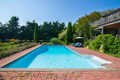 a view of a house with a big yard