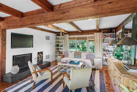 a kitchen with stainless steel appliances a sink and wooden cabinets