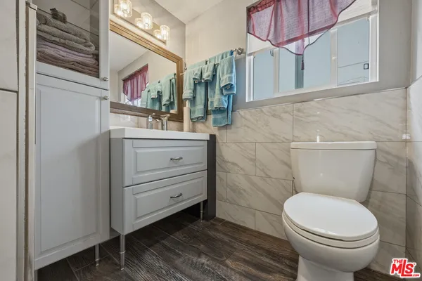 a workspace room with furniture and windows