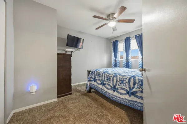 a bathroom with a double vanity sink mirror and