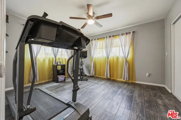 a bedroom with a bed and furniture