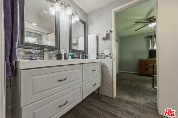 a view of a house with a street