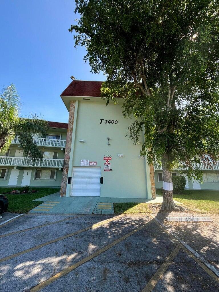 3400 Springdale Boulevard, Unit 217 Palm Springs, FL 33461 - Photo 1 of 15 Front
