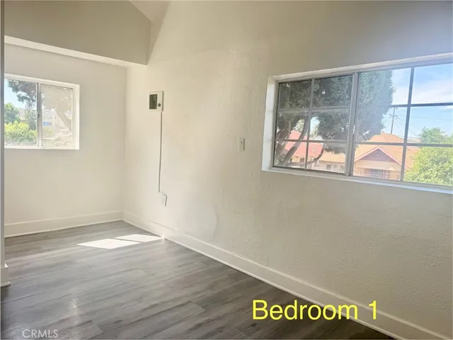 a view of an empty room with painted walls