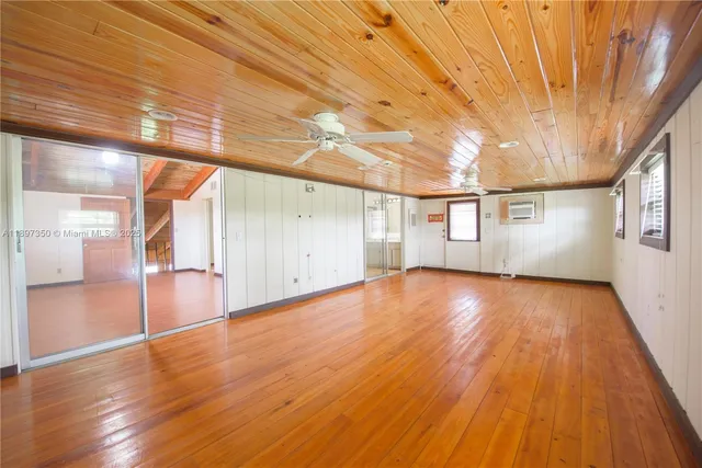 a view of a livingroom with wooden floor