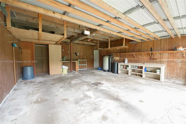 a view of a house with a yard and porch