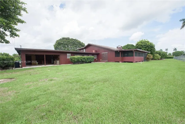 a fire hydrant in the middle of a field