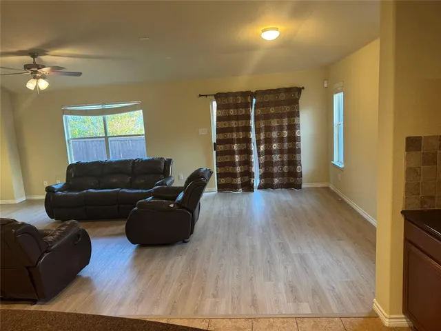 a bathroom with a tub and sink
