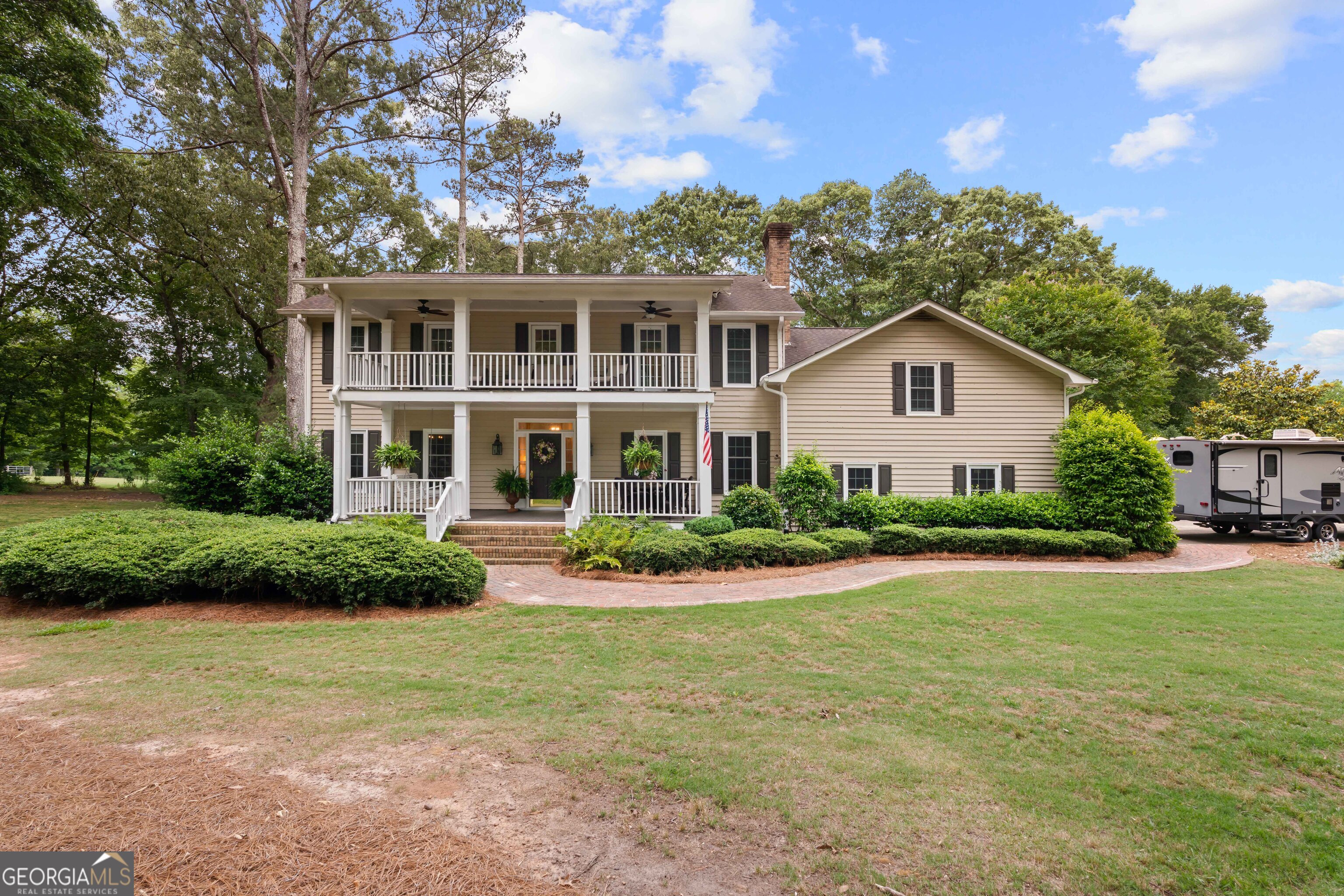 836 Oak Grove Road Carrollton, GA 30117 - Photo 3 of 50 a front view of a house with a yard