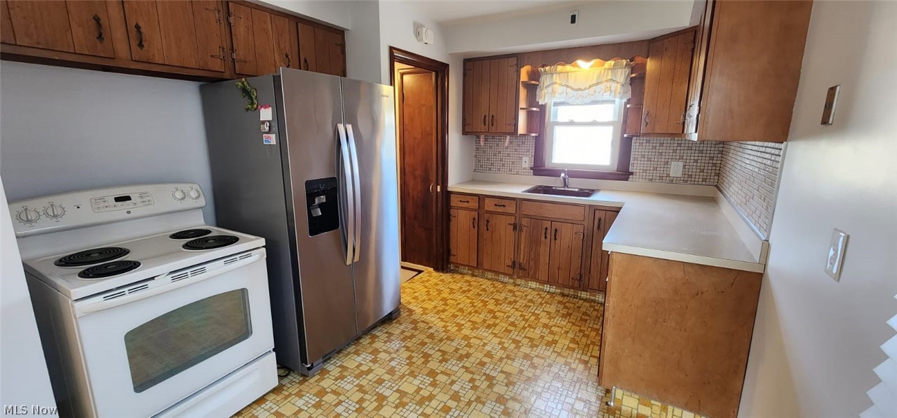 30121 Barjode Road Willowick, OH 44095 - Photo 9 of 19 Kitchen comes complete with stove and refrigerator.