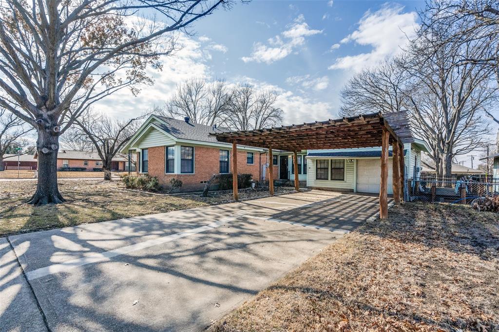 813 19th Street Plano, TX 75074 - Photo 12 of 12 a front view of a house with a yard