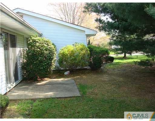 716 B Delair Road Monroe Township, NJ 08831 - Photo 2 of 13 a view of a backyard
