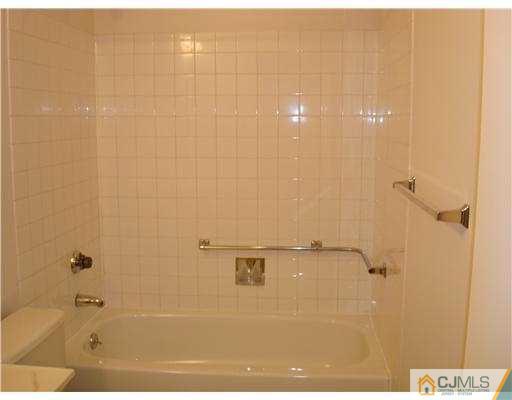 716 B Delair Road Monroe Township, NJ 08831 - Photo 11 of 13 a bathroom with a shower