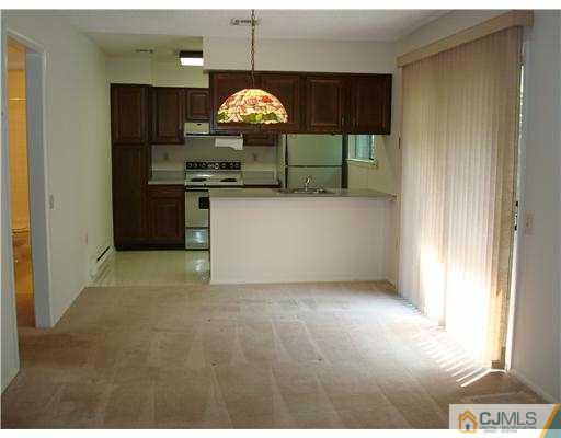 716 B Delair Road Monroe Township, NJ 08831 - Photo 7 of 13 a view of kitchen with stove and refrigerator