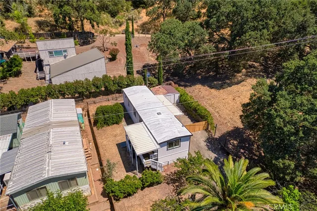 a kitchen with a stove and a refrigerator