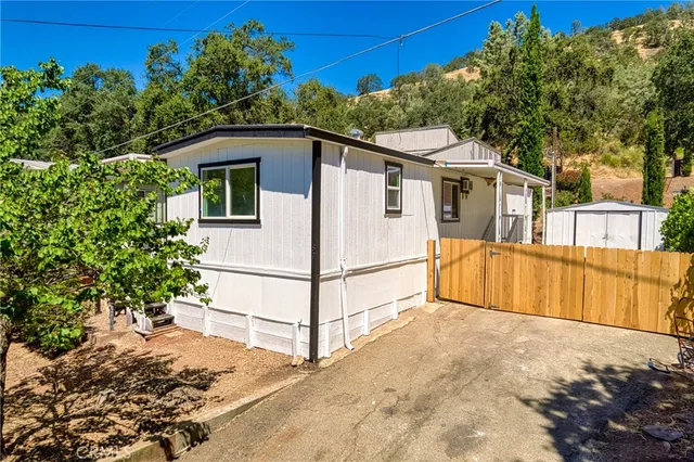 a view of backyard with green space