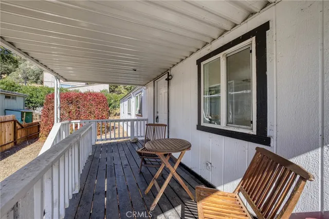 a kitchen with sink cabinets and wooden floor