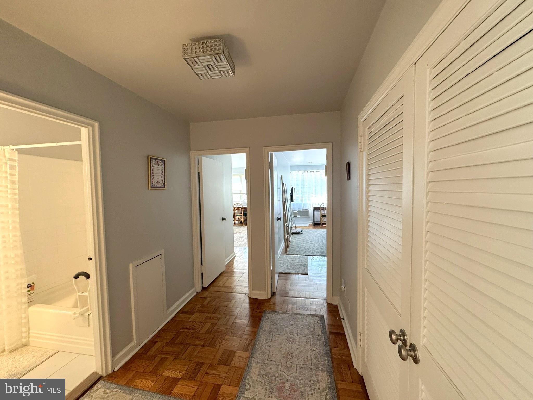 40 Old Lancaster Road, Unit 215 Merion Station, PA 19066 - Photo 12 of 23 Hallway to Hall Bath & Walk-in Closet