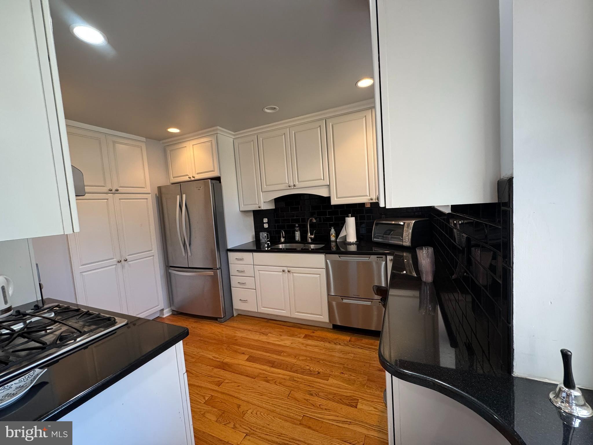 40 Old Lancaster Road, Unit 215 Merion Station, PA 19066 - Photo 9 of 23 Spacious Enlarged Kitchen