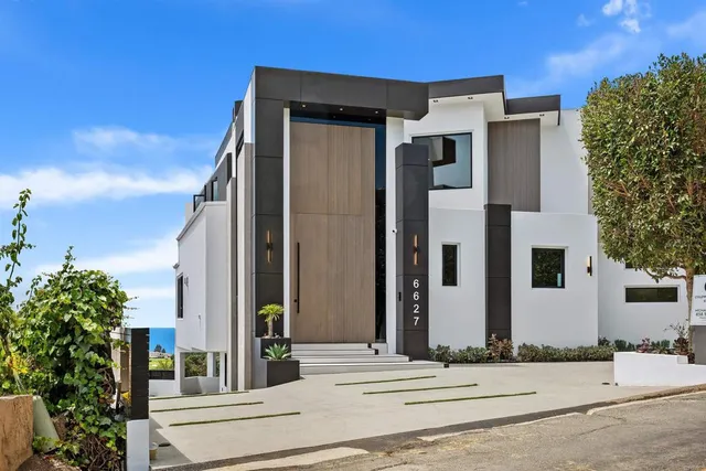 an aerial view of a city with lots of residential buildings