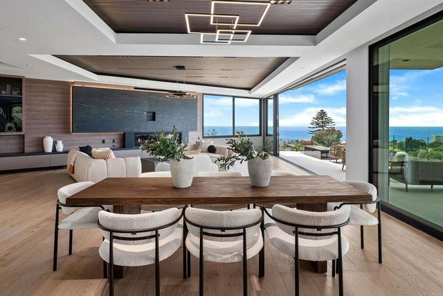 a bedroom with furniture and a flat screen tv