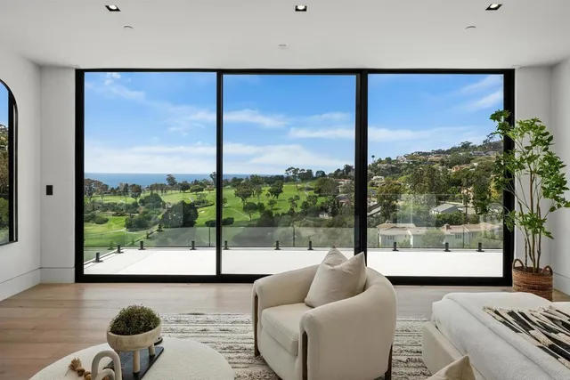 a bathroom with double sink and a mirror