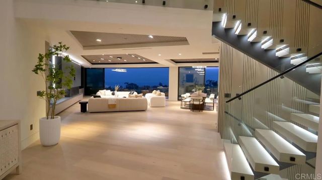 a balcony with furniture and city view