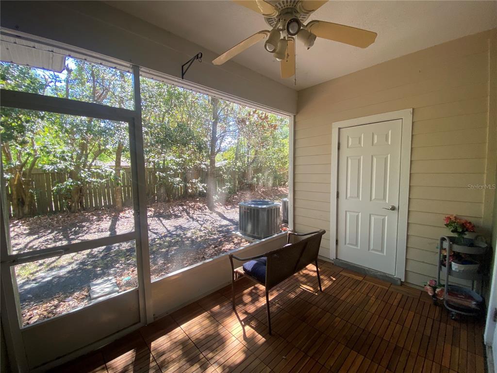 2508 Southwest 35th Place, Unit S111 Gainesville, FL 32608 - Photo 11 of 22 a living room with hardwood floor and a large window