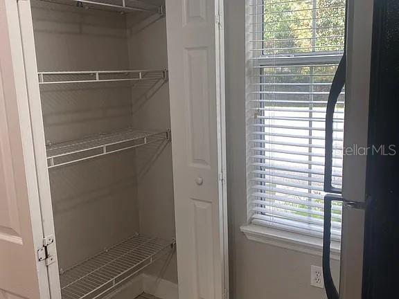 2508 Southwest 35th Place, Unit S111 Gainesville, FL 32608 - Photo 22 of 22 a bathroom with a glass shower door