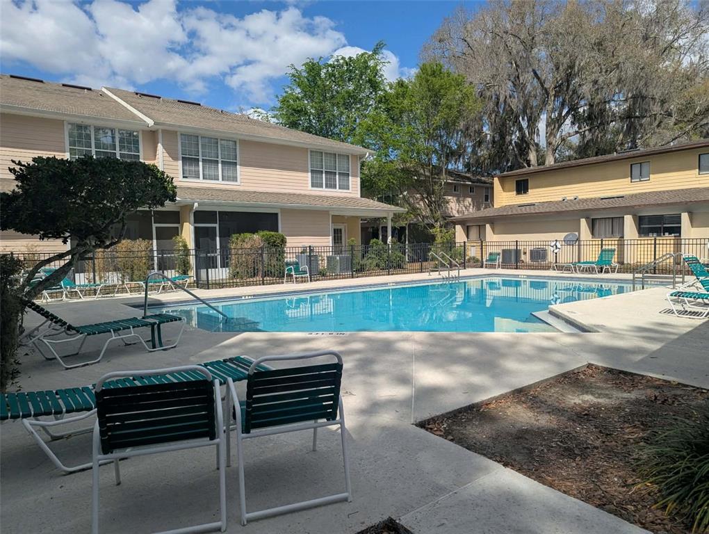 2508 Southwest 35th Place, Unit S111 Gainesville, FL 32608 - Photo 5 of 22 a view of a house with backyard and sitting area