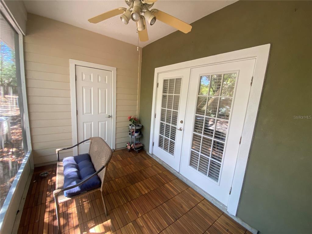 2508 Southwest 35th Place, Unit S111 Gainesville, FL 32608 - Photo 10 of 22 a view of a livingroom with furniture and a ceiling fan