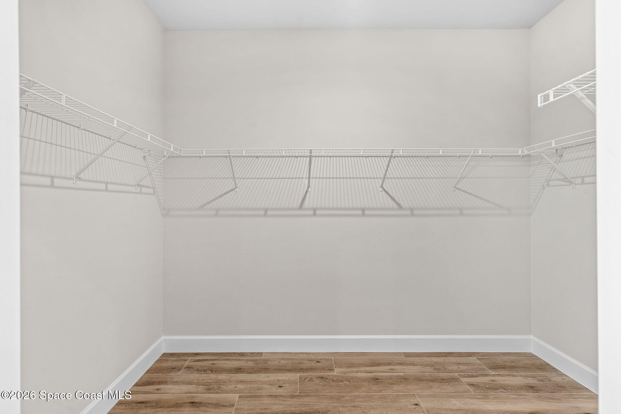 298 Lachine Street Southwest Palm Bay, FL 32908 - Photo 14 of 32 Primary Walk in Closet