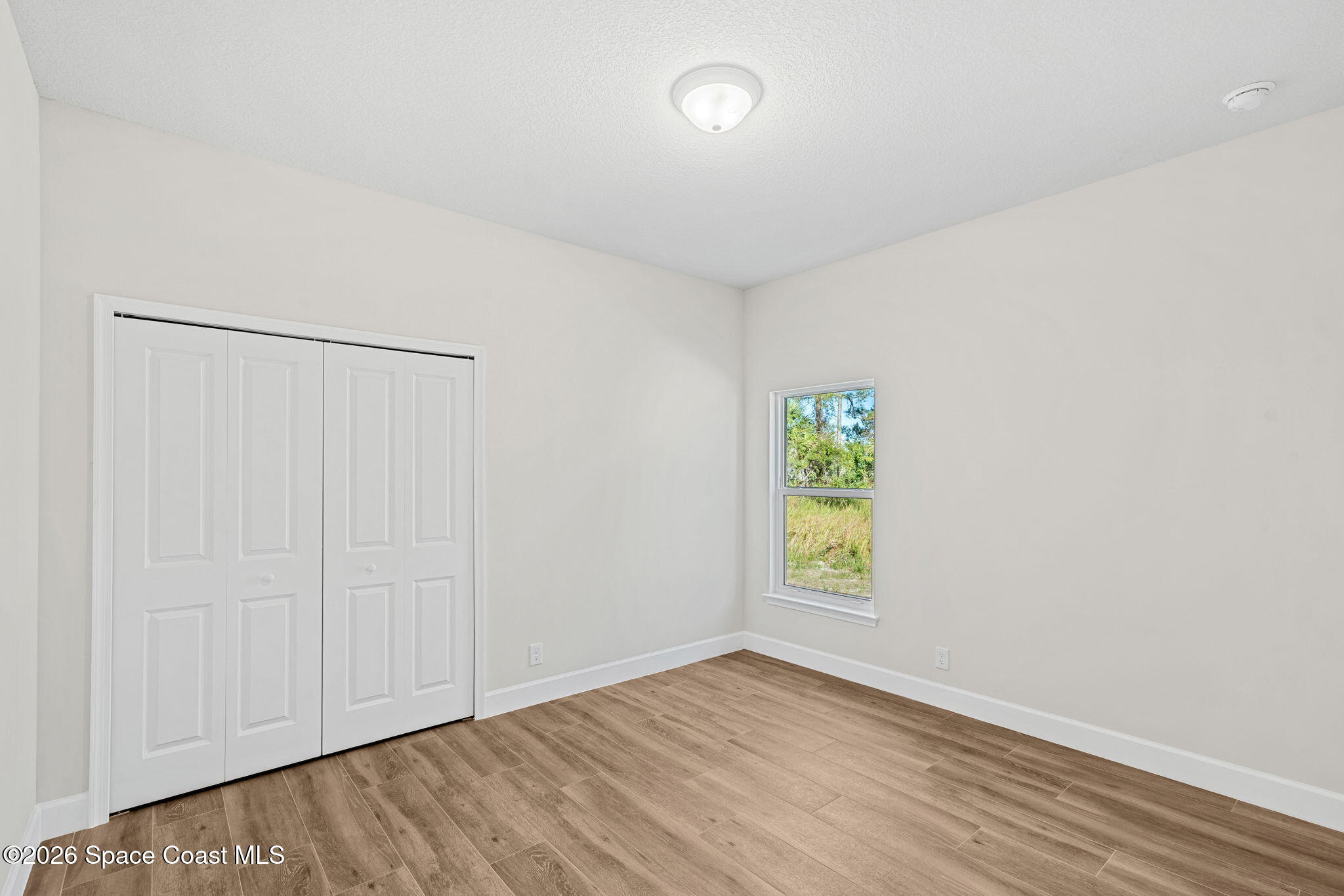 298 Lachine Street Southwest Palm Bay, FL 32908 - Photo 16 of 32 Bedroom 3