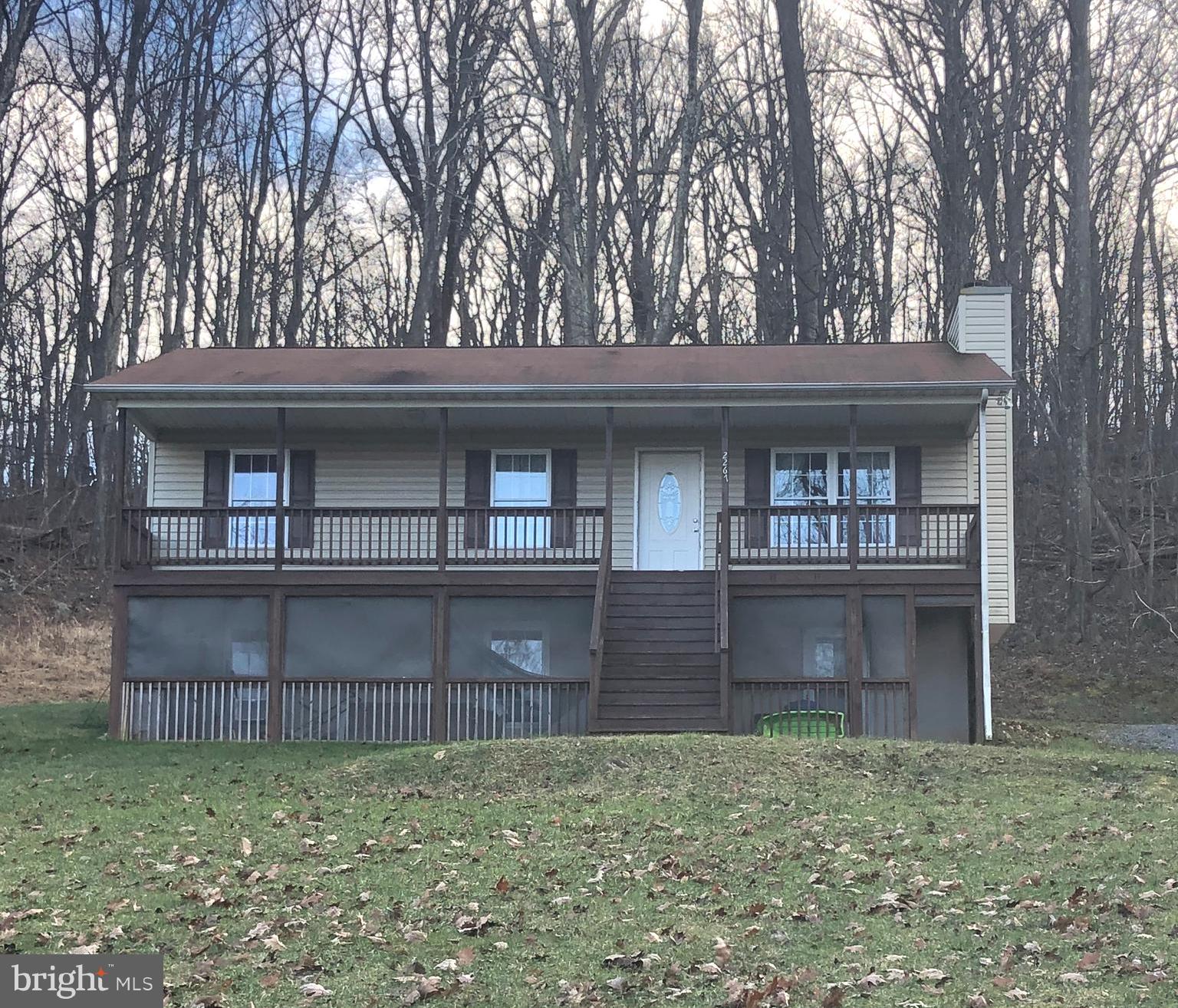 2267 High Top Road Linden, VA 22642 - Photo 1 of 2 a front view of a house with a yard