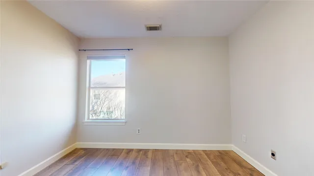 a bathroom with a sink a mirror and a shower