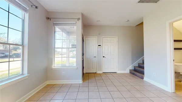 a kitchen with stainless steel appliances a refrigerator sink and stove