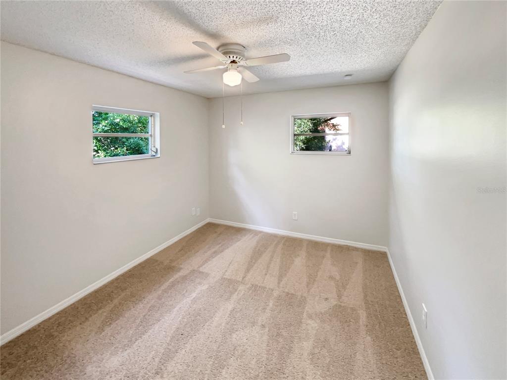 352 Sesame Avenue Apopka, FL 32703 - Photo 20 of 27 an empty room with a window