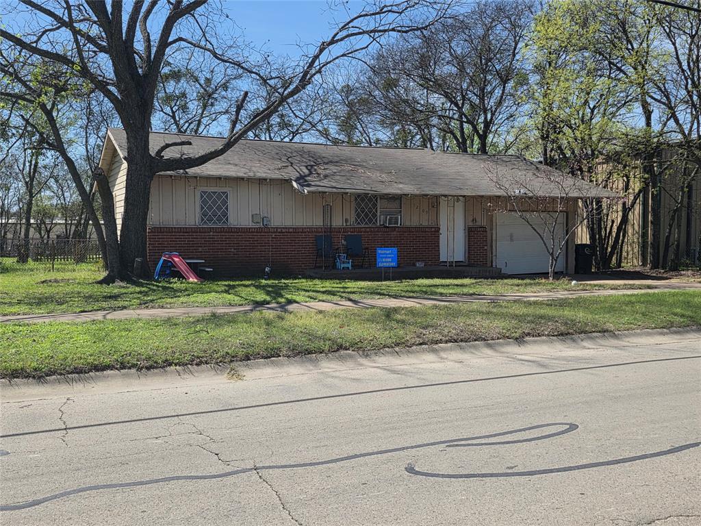 1209 North Anglin Street Cleburne, TX 76031 - Photo 1 of 1 a view of a house with a yard