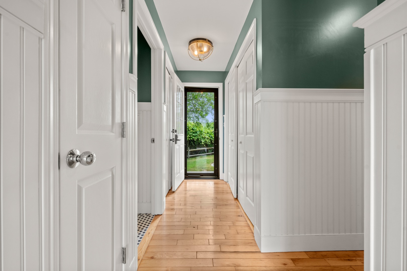 4 Berkley Street Nantucket, MA 02554 - Photo 27 of 47 a view of a hallway with wooden floor and entryway