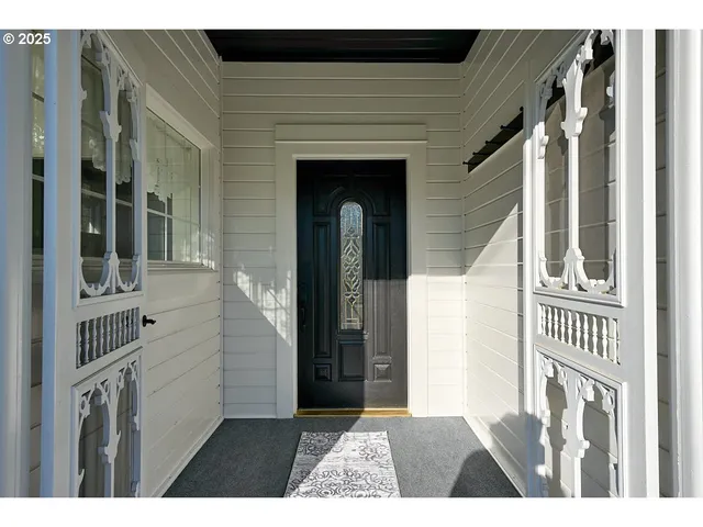 a view of an entryway with a fireplace