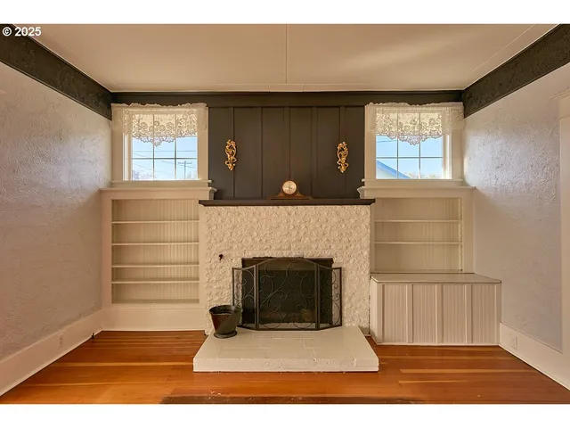 a living room with a fireplace