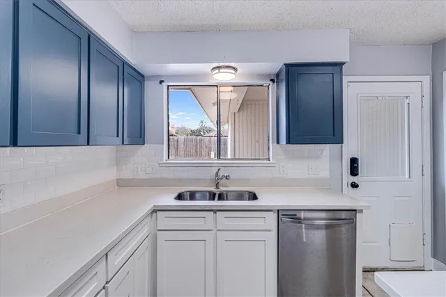 a view of a sink and a mirror