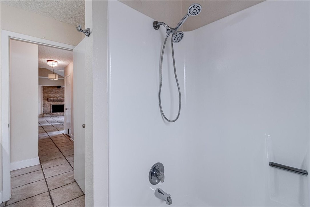 985 Crossbill Street Corpus Christi, TX 78418 - Photo 20 of 40 a bathroom with a shower
