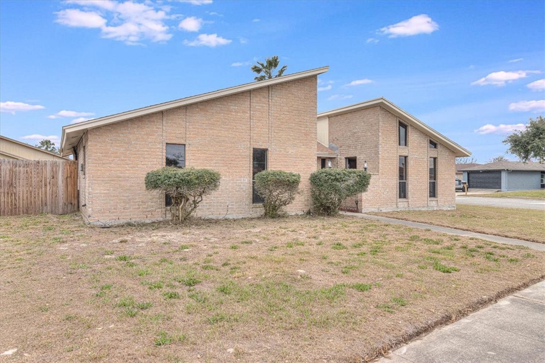 985 Crossbill Street Corpus Christi, TX 78418 - Photo 40 of 40 a view of a house with backyard