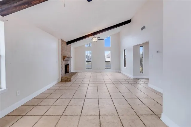 a view of an empty room and window