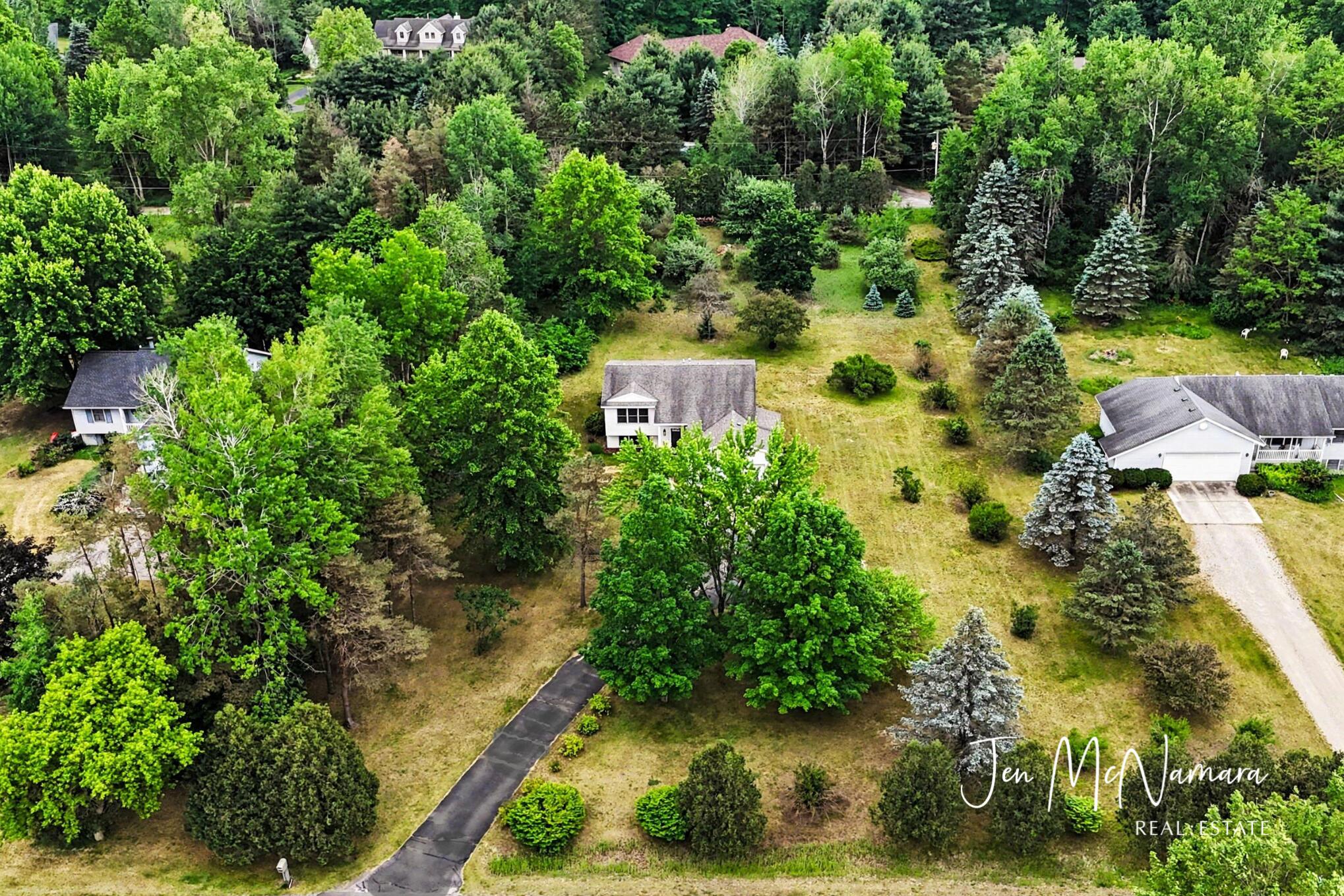 4050 Rector Street Northeast Rockford, MI 49341 - Photo 1 of 32 Arial Front