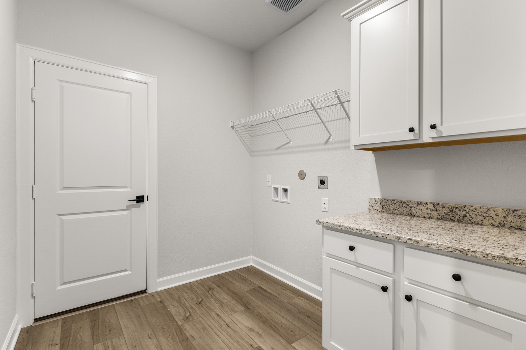 3202 Bolt Rope Drive Texas City, TX 77510 - Photo 8 of 18 a view of cabinets and wooden floor